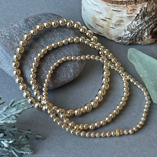 Gold and Silver Beaded Bracelets
