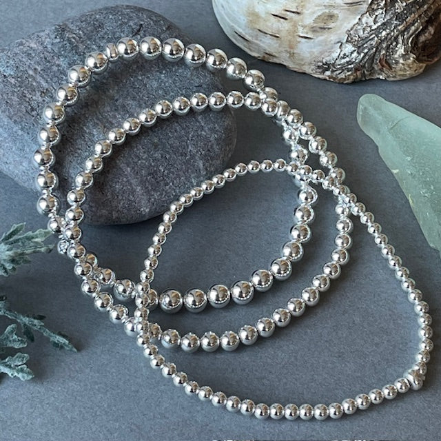 Gold and Silver Beaded Bracelets